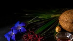 Tropical botanicals butterfly pea, pandan, roselle and coconut with natural extract on dark slate