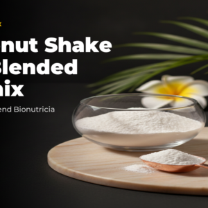 Fine white coconut shake powder in elegant glass bowl with rose gold scoop on warm marble, tropical flower accent