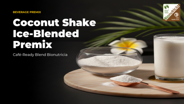 Fine white coconut shake powder in elegant glass bowl with rose gold scoop on warm marble, tropical flower accent