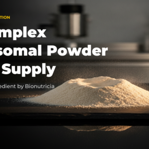Liposomal B complex powder shown as an ivory to pale golden mound on dark polished stone