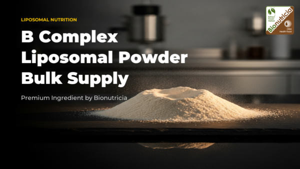 Liposomal B complex powder shown as an ivory to pale golden mound on dark polished stone