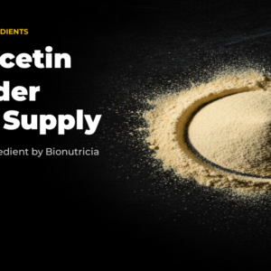 Liposomal quercetin powder shown as a mound of pale yellow powder on a dark surface