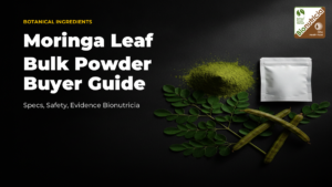 Vivid green moringa leaf powder with fresh moringa leaves on a dark studio surface